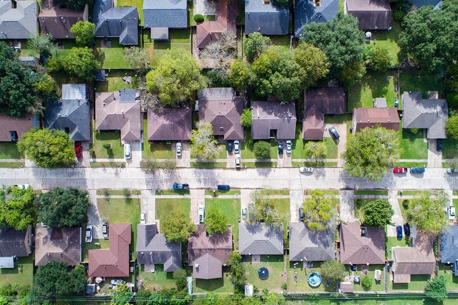 Texas Insurance - Aerial View of Residential Home Community in Texas Suburb